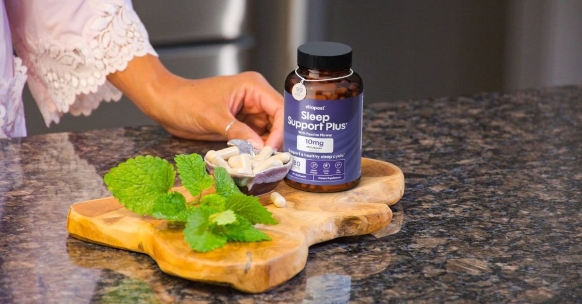 Sleep Support Plus supplement bottle on wooden table