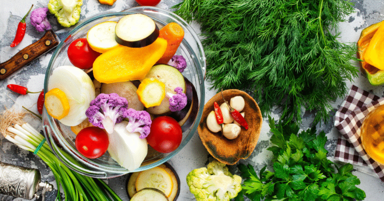 A variety of colorful, gut-healthy foods, including kefir, kimchi, and vegetables, illustrating how to improve gut health in 2025